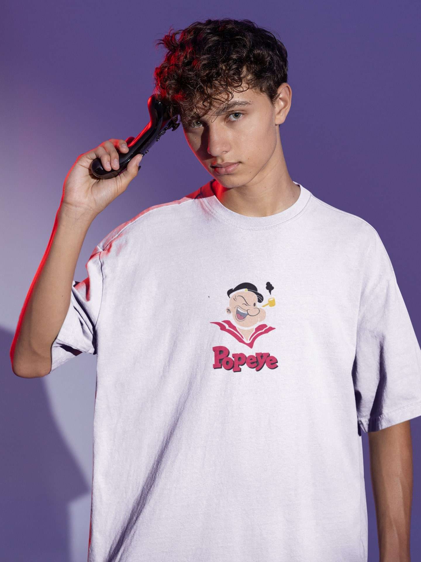 oversized-tee-mockup-of-a-man-posing-with-a-game-controller-to-his-head-m28457 (13) Oversized T-shirts for Men online