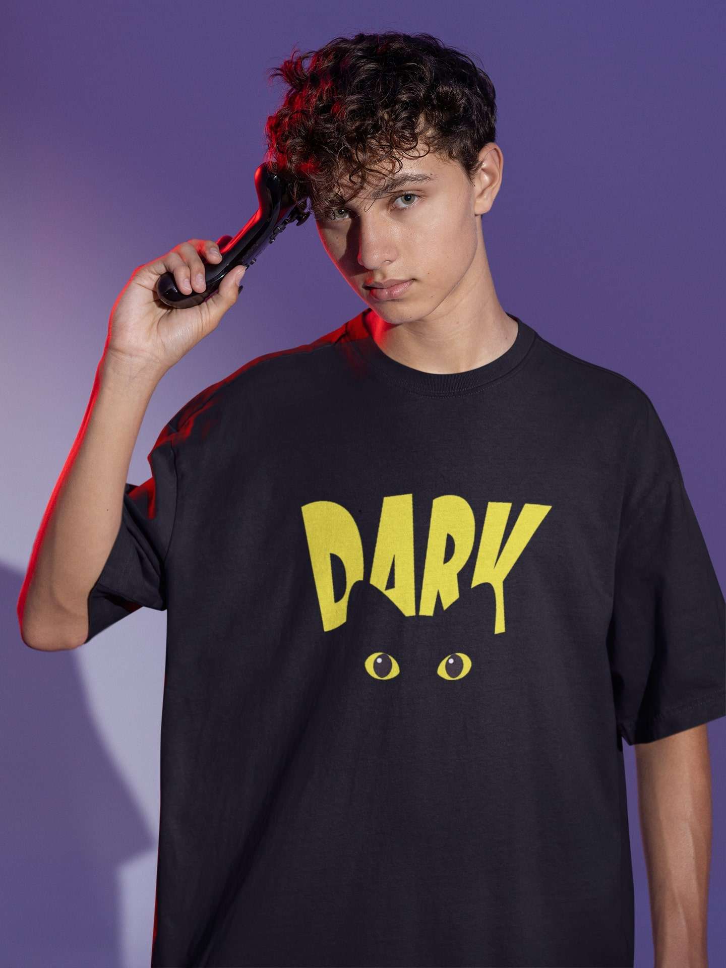 oversized-tee-mockup-of-a-man-posing-with-a-game-controller-to-his-head-m28457 (19) Oversized T Shirts Online